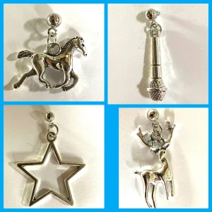 By prisförslag- välj 1 st av Fyra coola silvriga örhängen - Gäller 1 st. Finns fyra unika silvriga örhängen: en springande häst, en mikrofon, en öppen stjärna och en hjort med horn. Perfekta för dig som vill sticka ut och mixa olika stilar. Alla örhängen är i metall med snygg silverfinish.