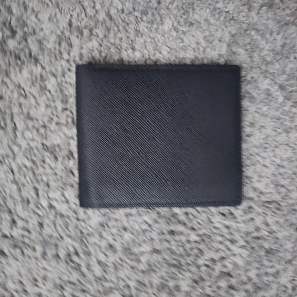 Svart plånbok med ögon - 1