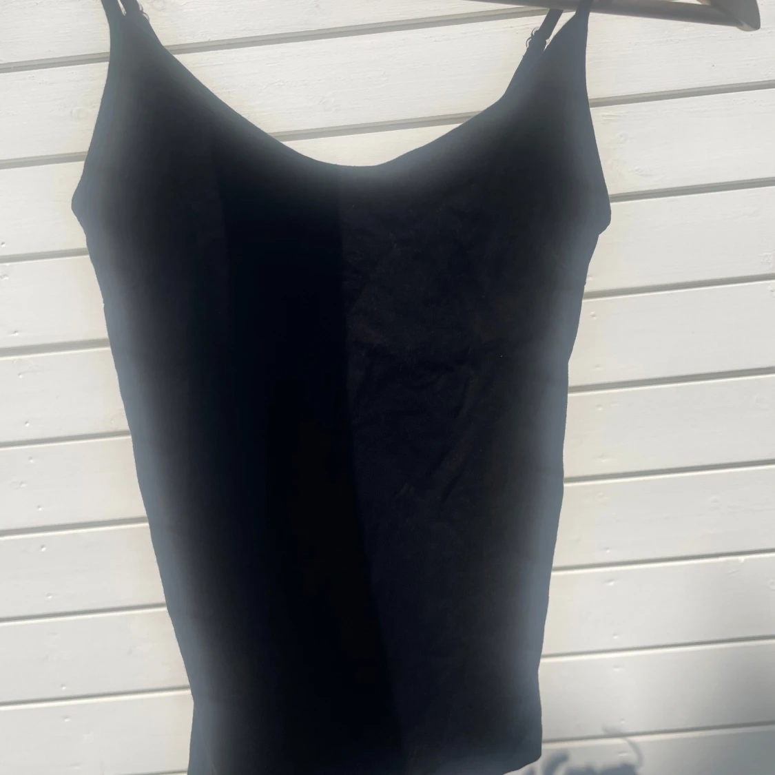 Svart linnetopp från 157 i XS