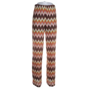 Zigg zagg byxor  - Färgglada byxor från Pimkie med ett zigzag-mönster. Tillverkade i en mjuk polyesterblandning med elastan för extra stretch. Perfekta för en unik och trendig stil. de är i storlek M men passar även för S och L