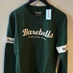 Barebells tröja - Barebells tröja i grön. Tröjan är en del av deras Ambassador Collection och kommer i originalförpackning. Limiterad och går ej att köpa