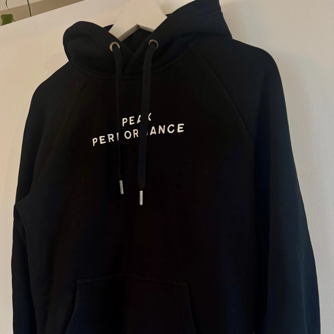 Svart hoodie Peak Performance S - 1