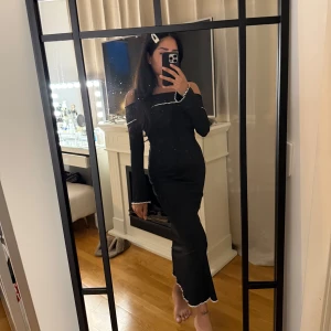 Långärmad klänning - Aldrig använd. 