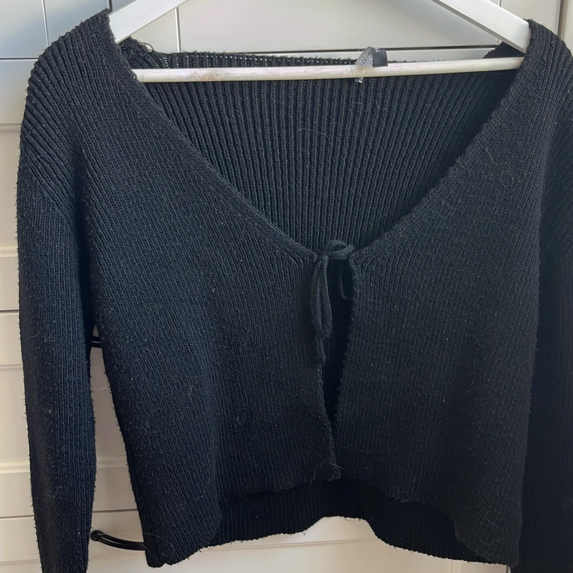 Svart stickad kofta från Trendyol