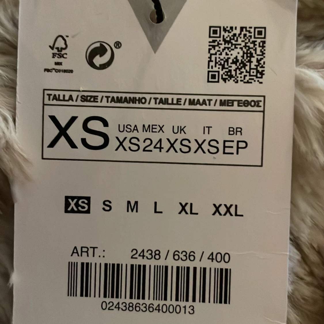 Blå långärmad body med cut-out och twistdetalj - 1