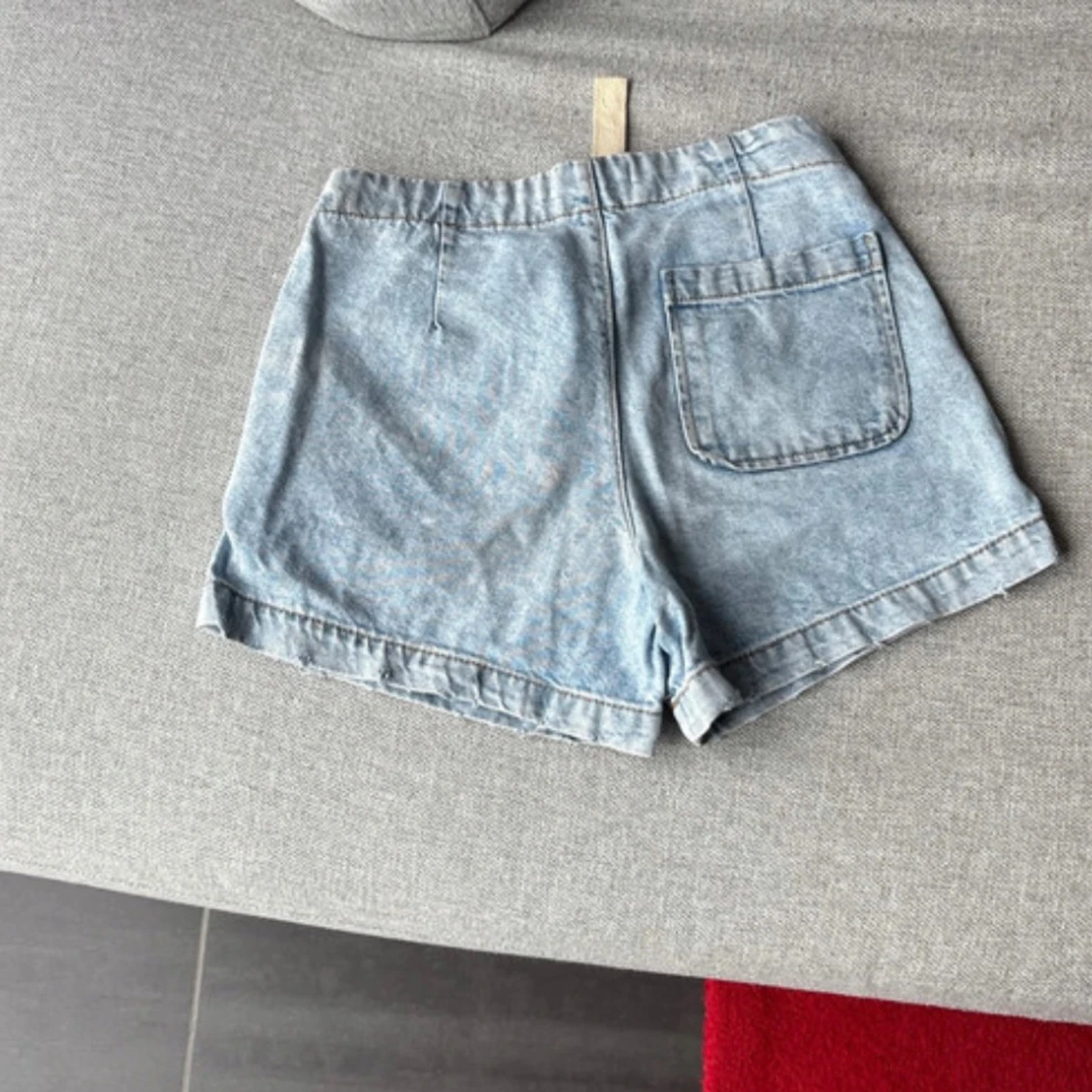 Blå jeansshorts med snörning - 1