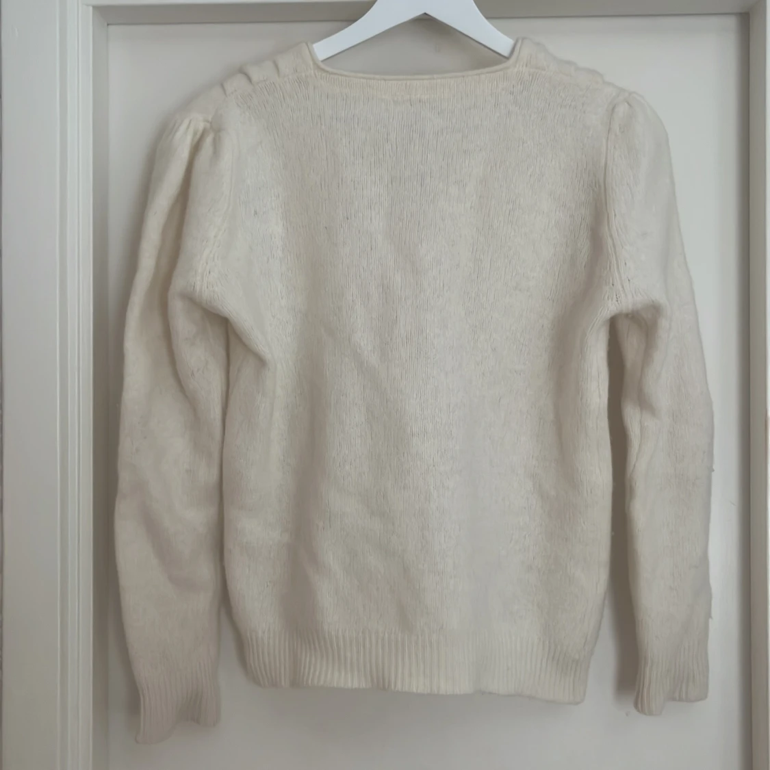 Krämvit ullkofta - 2