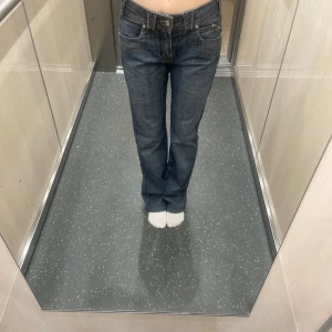 Vintage Bootcut jeans low waist - Helt ny , väldigt low waisted 