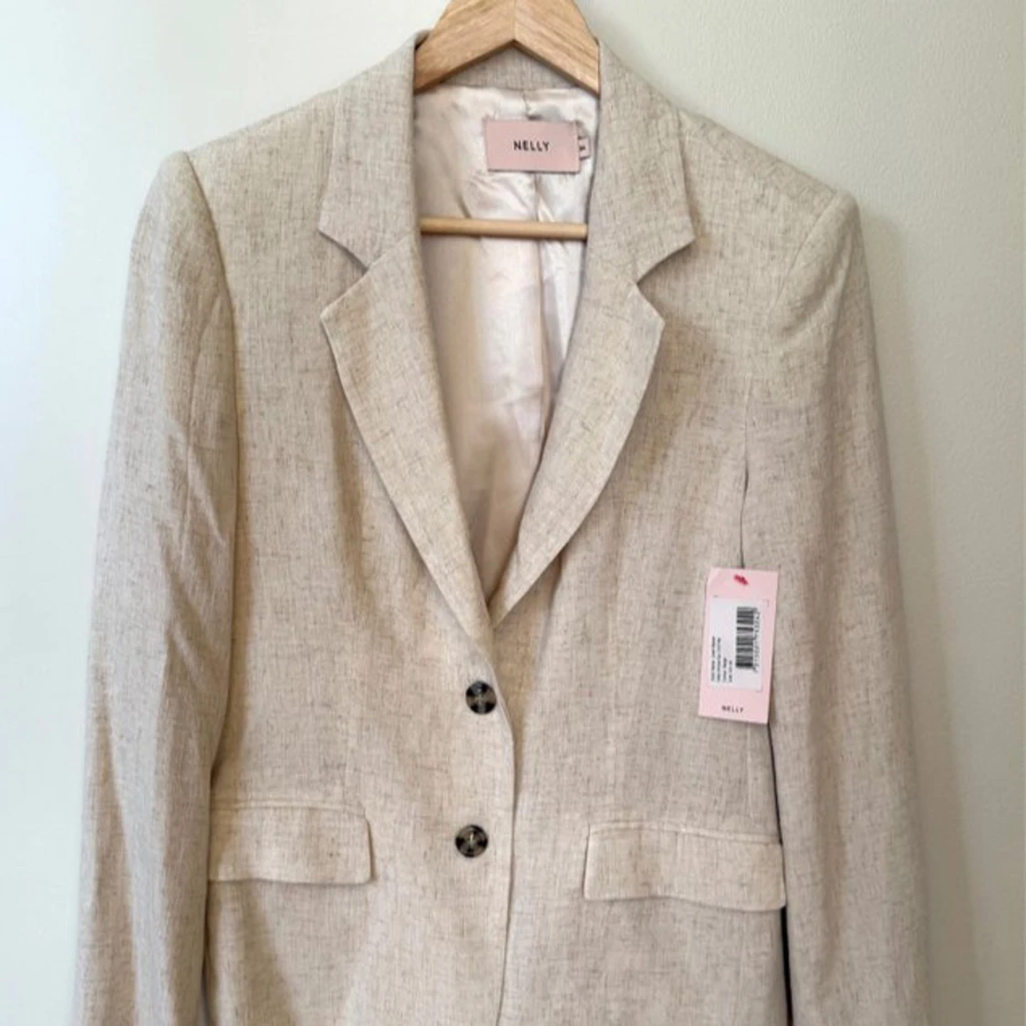 Linnekavaj beige oversize från Nelly strl 34