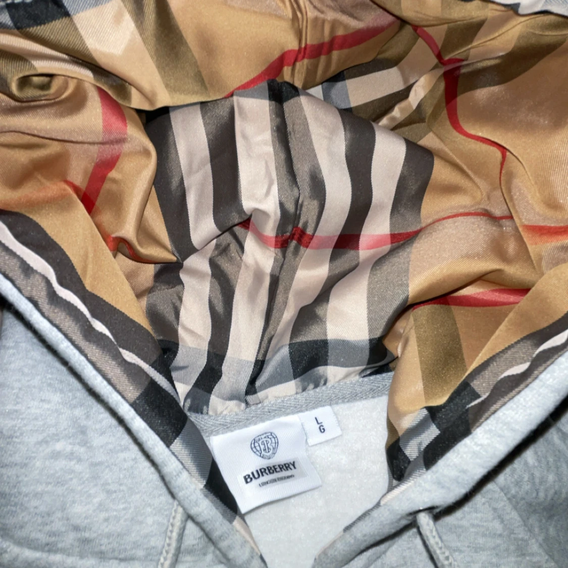 Grå hoodie från Burberry med mönstrad huva - 1