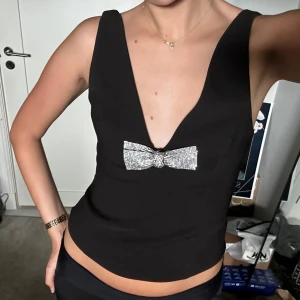 Svart korsett med rosett - superfin topp från Zara med en rosett fram ⭐️