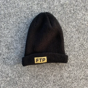FTP MÖSSA - Asfet FTP mössa från deras 10 year anniversary. Riktig rare. Perfekta mössan till vintern. Onesize. Helt ny.  FUCKTHEPOPULATION