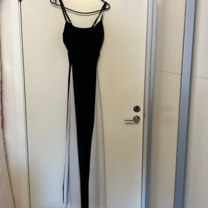 Lång klänning  - En lång klänning som är stretch bar 