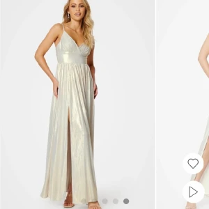 Balklänning - Säljer min balklänning jag hade på studentbalen. Den är endast använd en gång och är i nyskick. Den är uppsydd så den passar till längden 1.60-1.65. Skulle säga att den champagnefärgad/vit  men skiftar i olika ljus. Nypris 1299 och slutsåld på nätet.