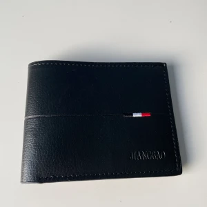 Plånbok  - Säljer en helt ny plånbok.