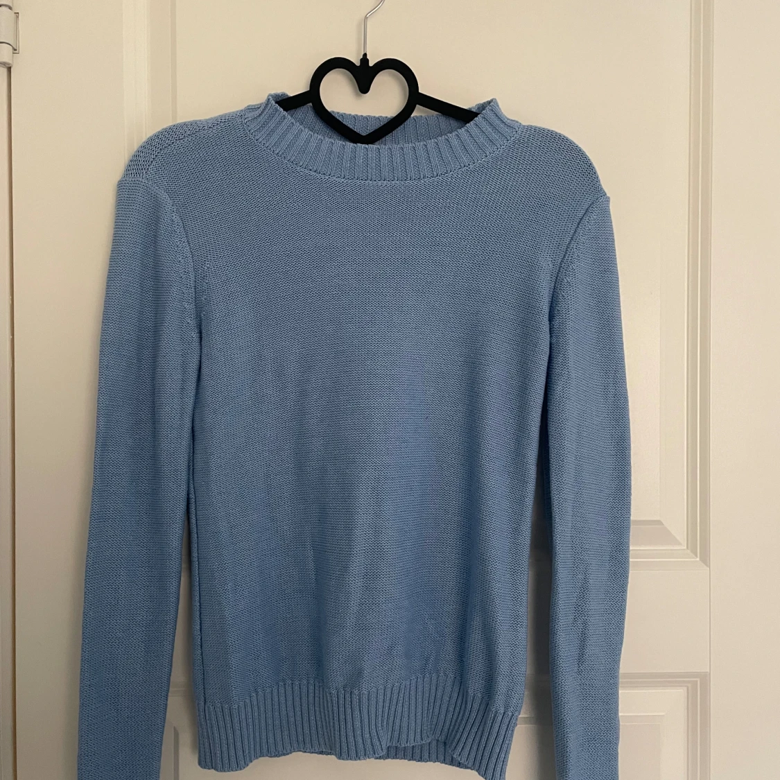 Blå tröjs
