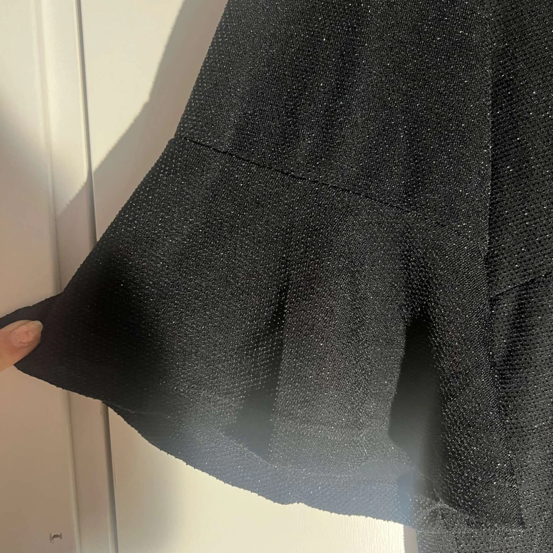 glittrig svart blus - 90