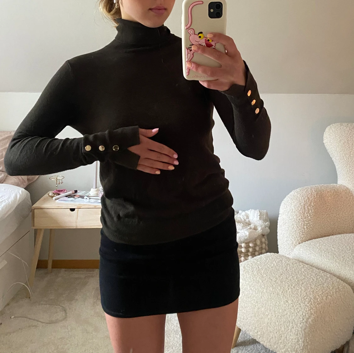 Mörkgrön polo med detaljer