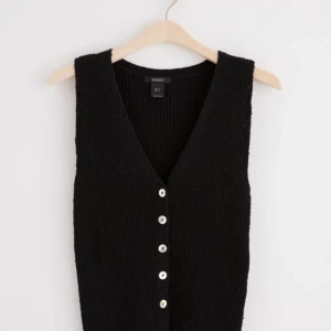 Stickad väst  - Stickad pullover från Lindex i bra skick. 