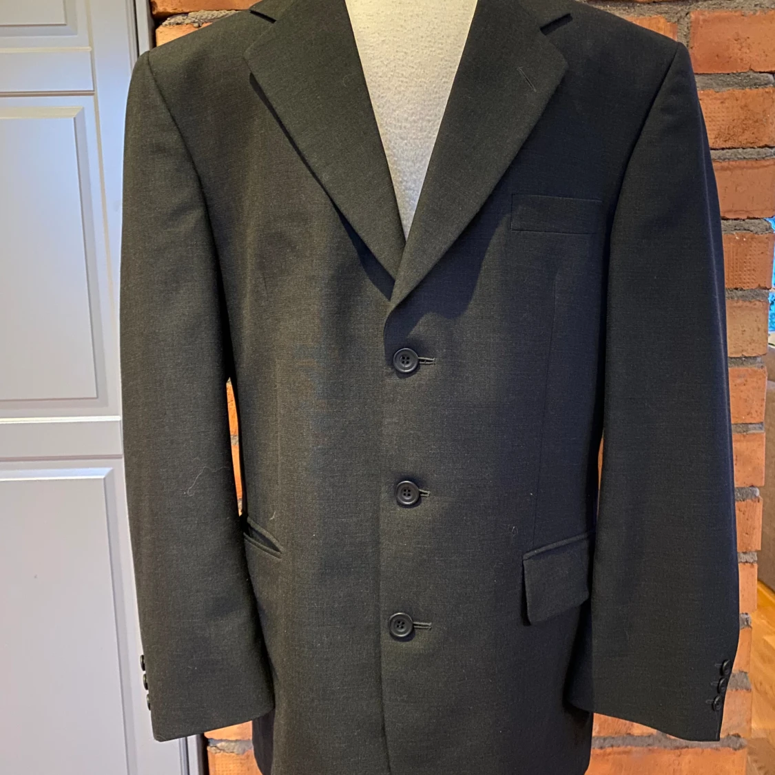 Kostym från Magni strl 52