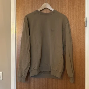 Boss - Snygg Boss tröja i brun färg storlek s 