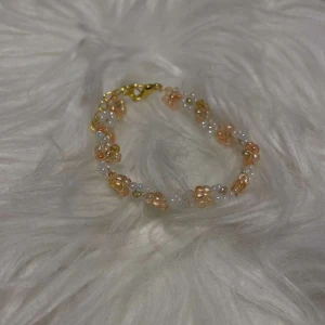 Blommigt armband med länk  - Blommigt armband med guld länk