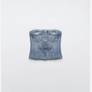 En korsett topp i jeans från Zara. Köpt för 329kr, helt slutsåld, nyskick