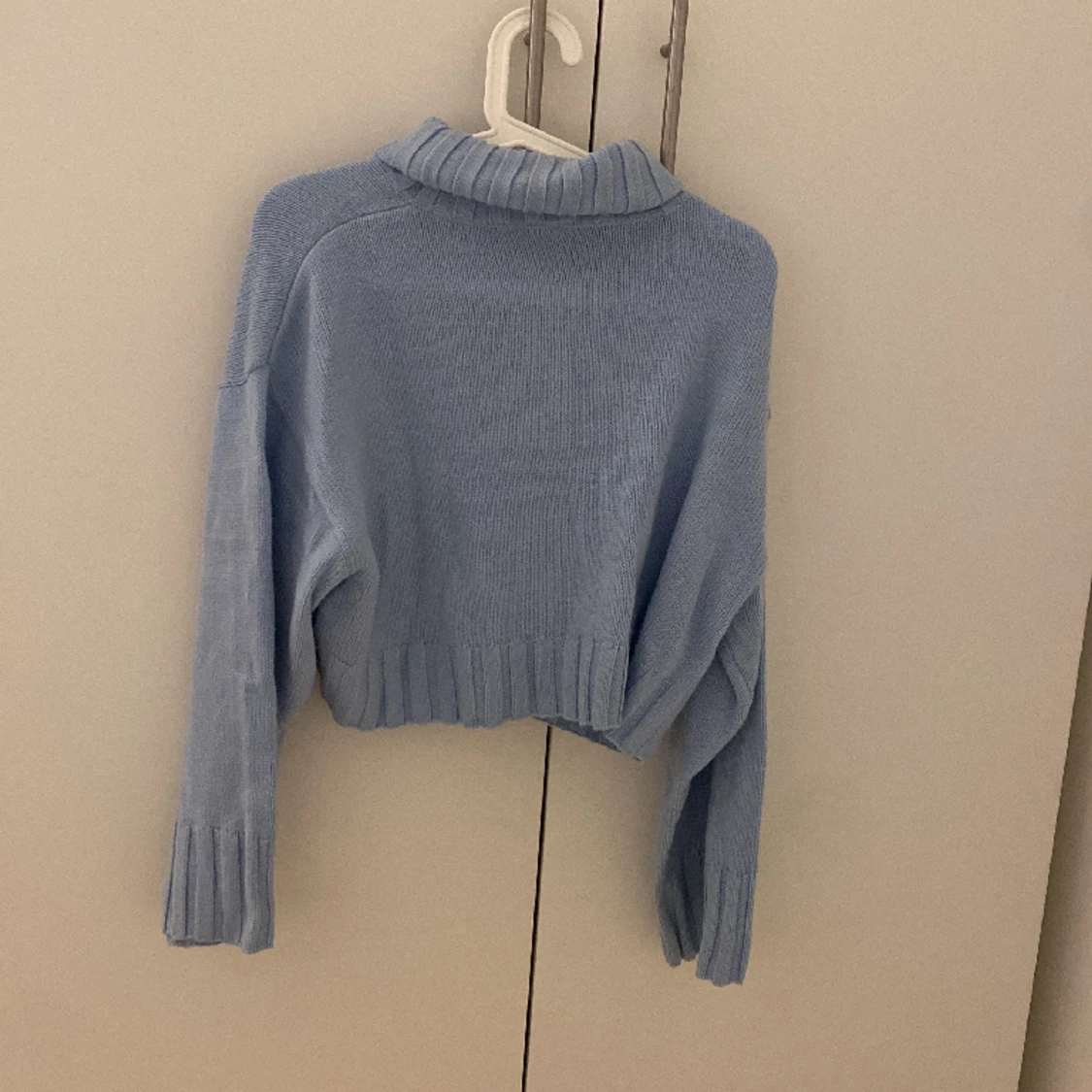 fin blå stickad tröja  - 91