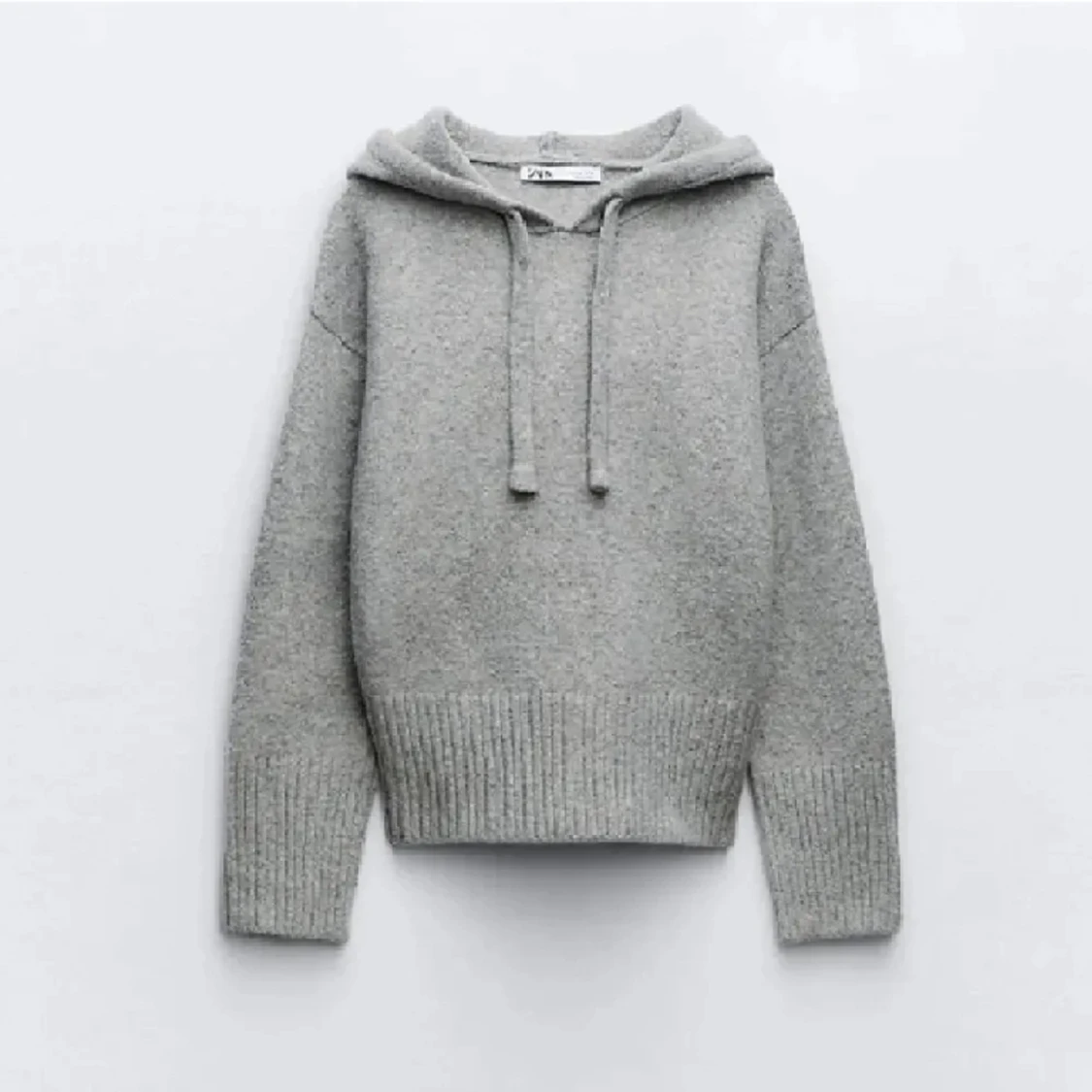 Stickad hoodie