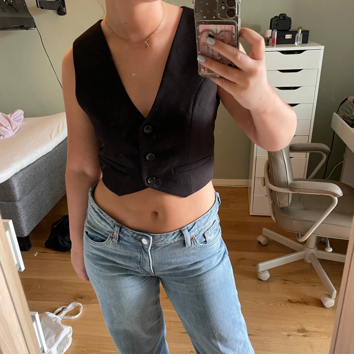 Svart kostymväst