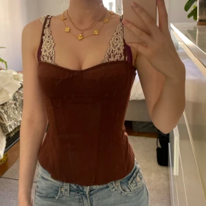 Brun korsett topp  - Brun korsett topp i storlek XXS