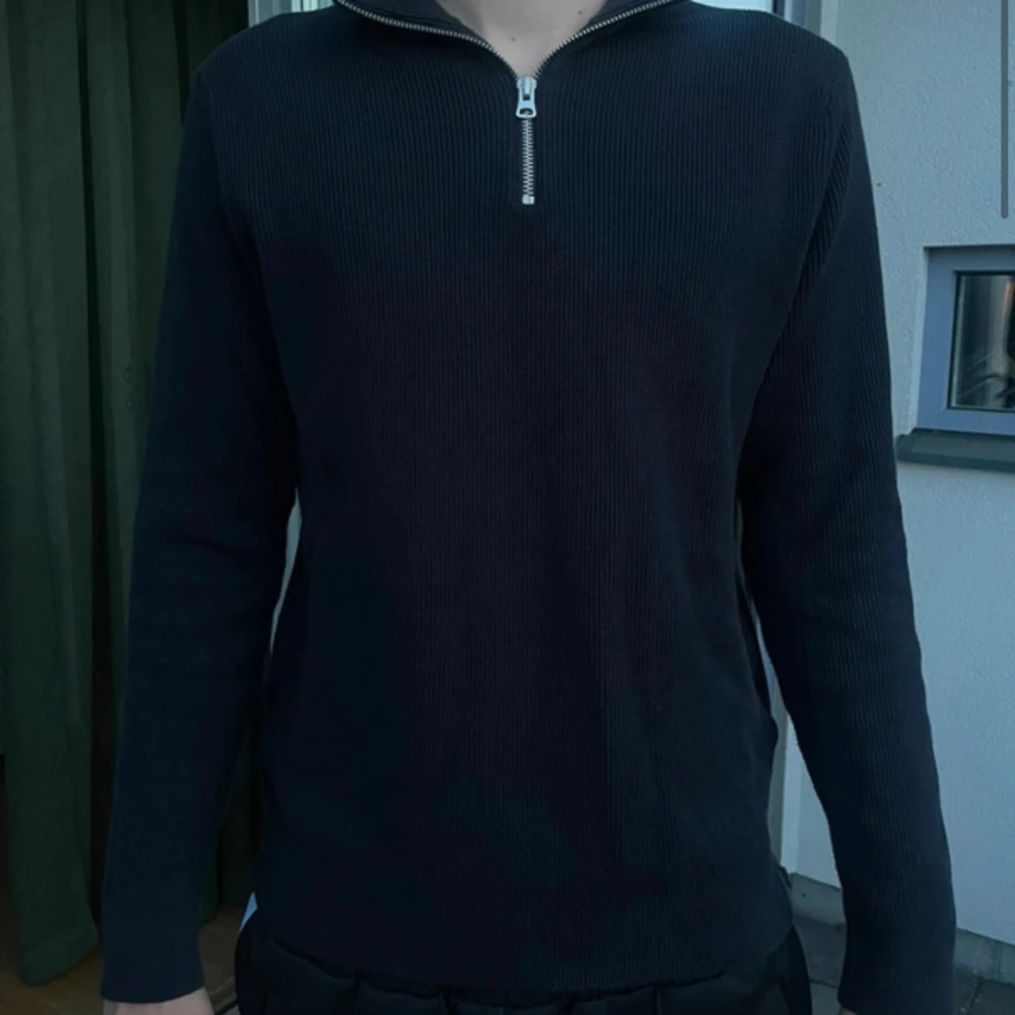 Stickad halv zip tröja