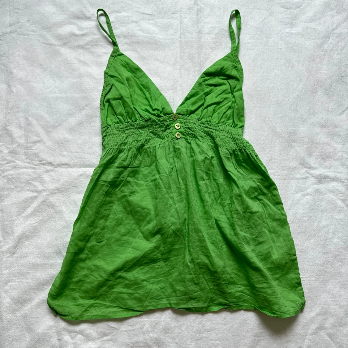 Grön linnetopp från Tansu