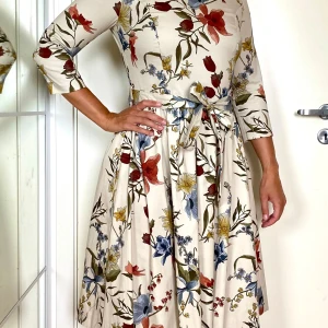 Floral Cream Dress - New, with, tags, worn twice only for the recordings and a photoshoot.  The dress is from 2020 and made in Poland (EU).  Great quality, nicely sewn. It was a gift from the brand.