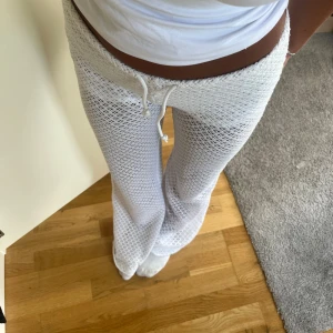 Virkade byxor  - Virkade byxor med shorts inbyggt , storlek xs