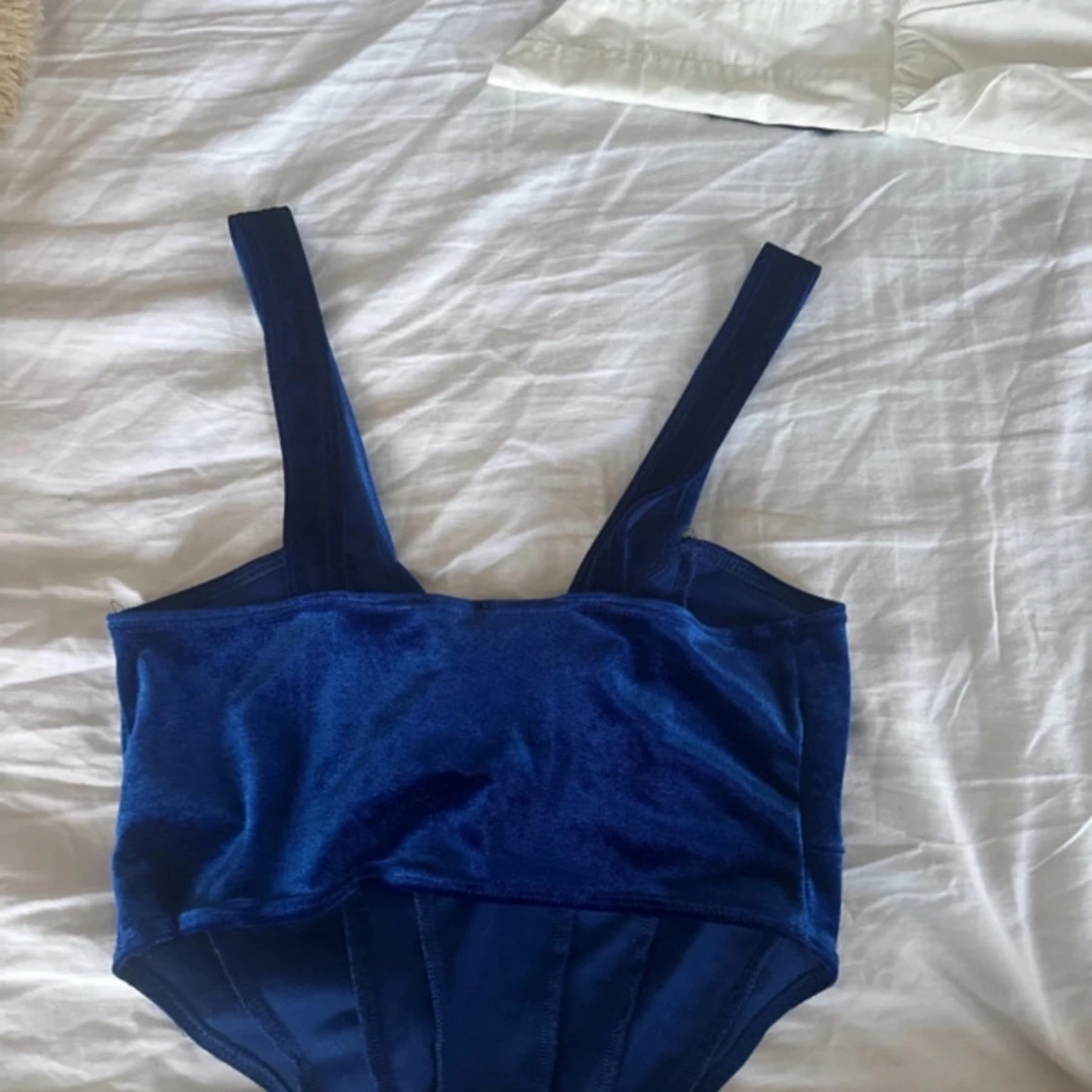 Blå topp med knytdetalj - 90