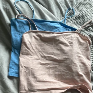 Blå o rosa linnen  - Köpta fårn Hm, nästan aldrig använda. Ljus rosa o blå