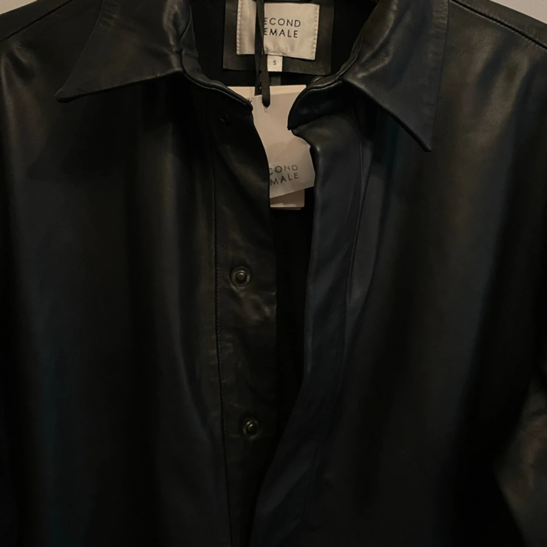 Skinnklänning. Äkta skinn. Helt ny. - 90