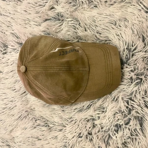 Grön keps - Grön keps