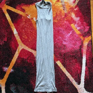 Lång najs tajt klänning - Stretchig