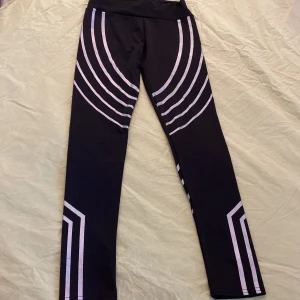 Träningstights / byxor - Träningsbyxor  med reflex 