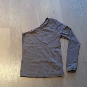En ärms tröja, storklek XS 150. Oanvänd 