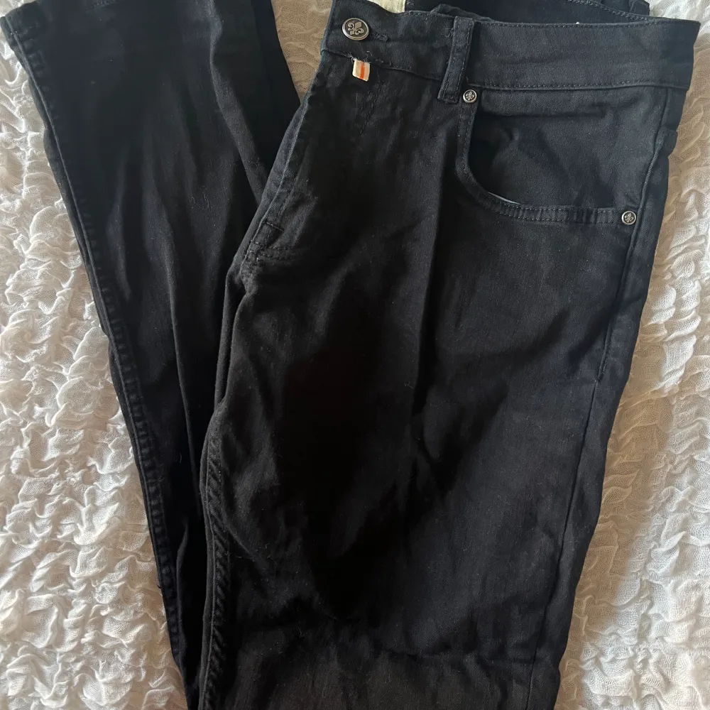 Svarta Morris jeans Slim fit Passar 180/185 cm. Jeans & Byxor.