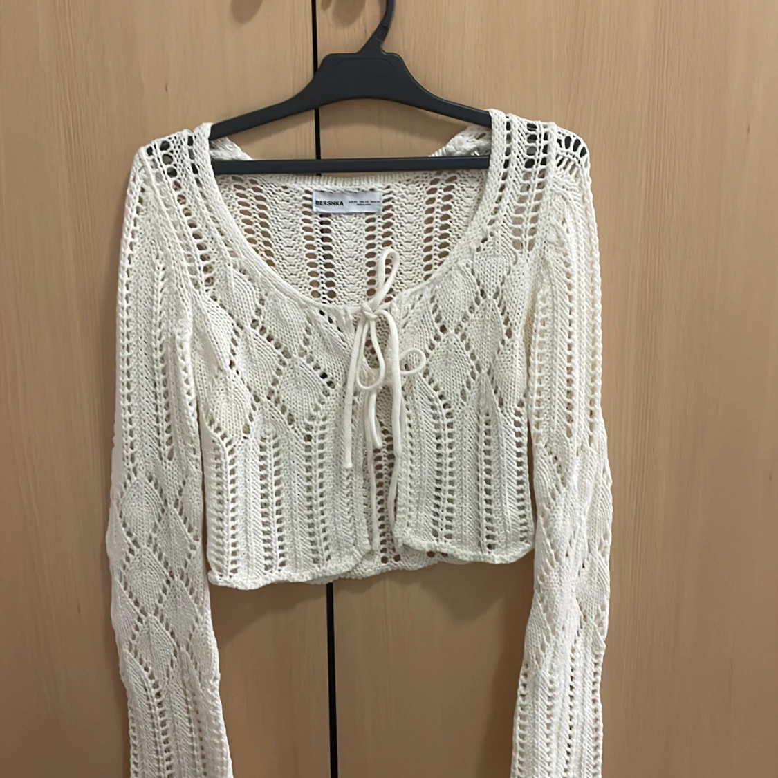 Krämvit kofta  - 90