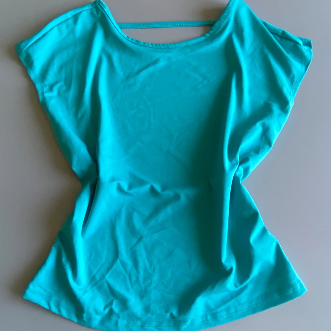 Turkos tröja med öppen rygg - 90