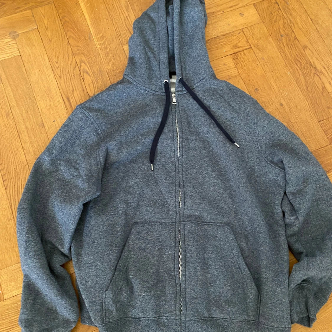 Gråblå Huvtröja. HM. Storlek xl