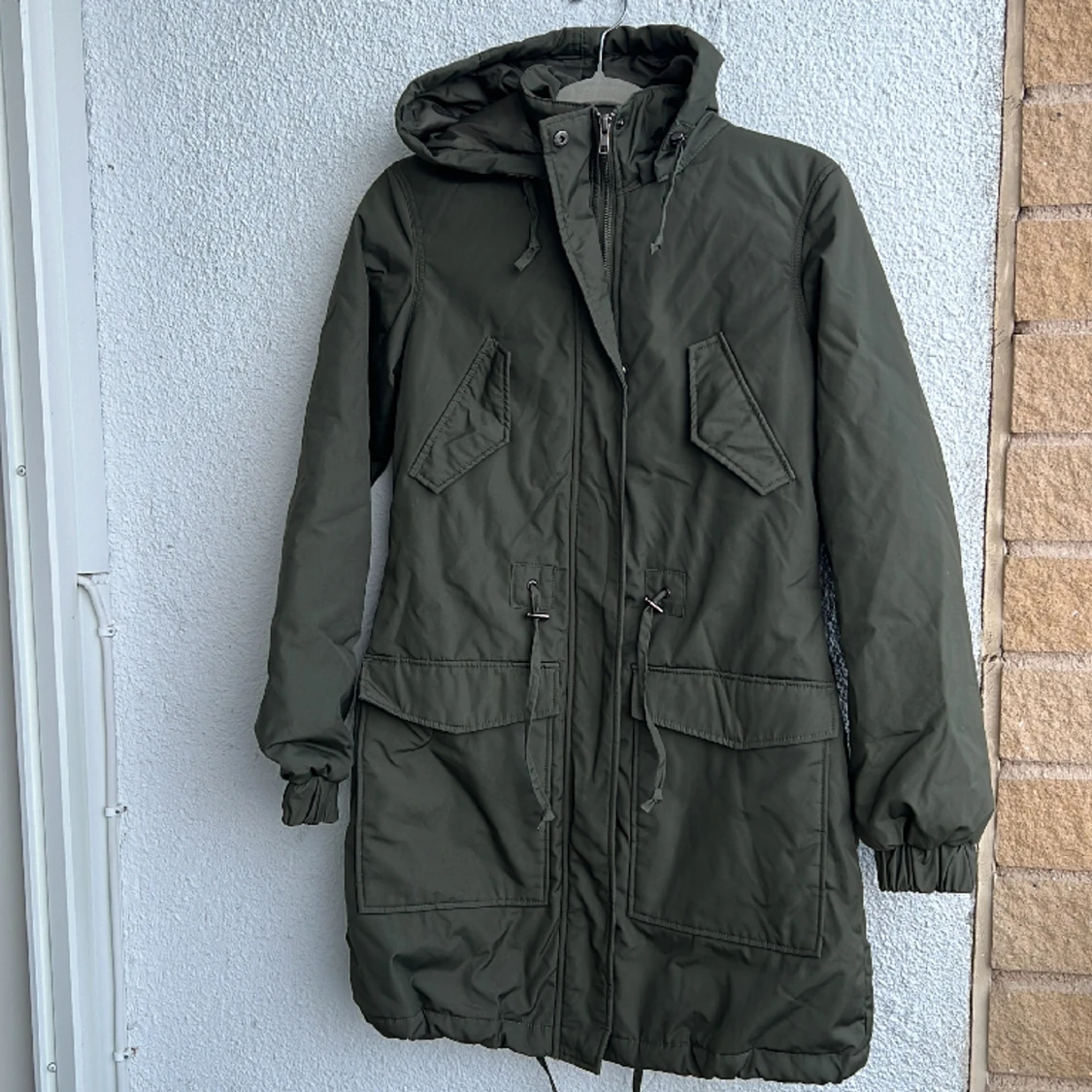 Grön lång jacka från Vila