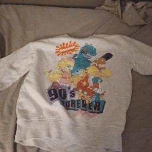 Grå tröja  - Hämta här eller postnord 