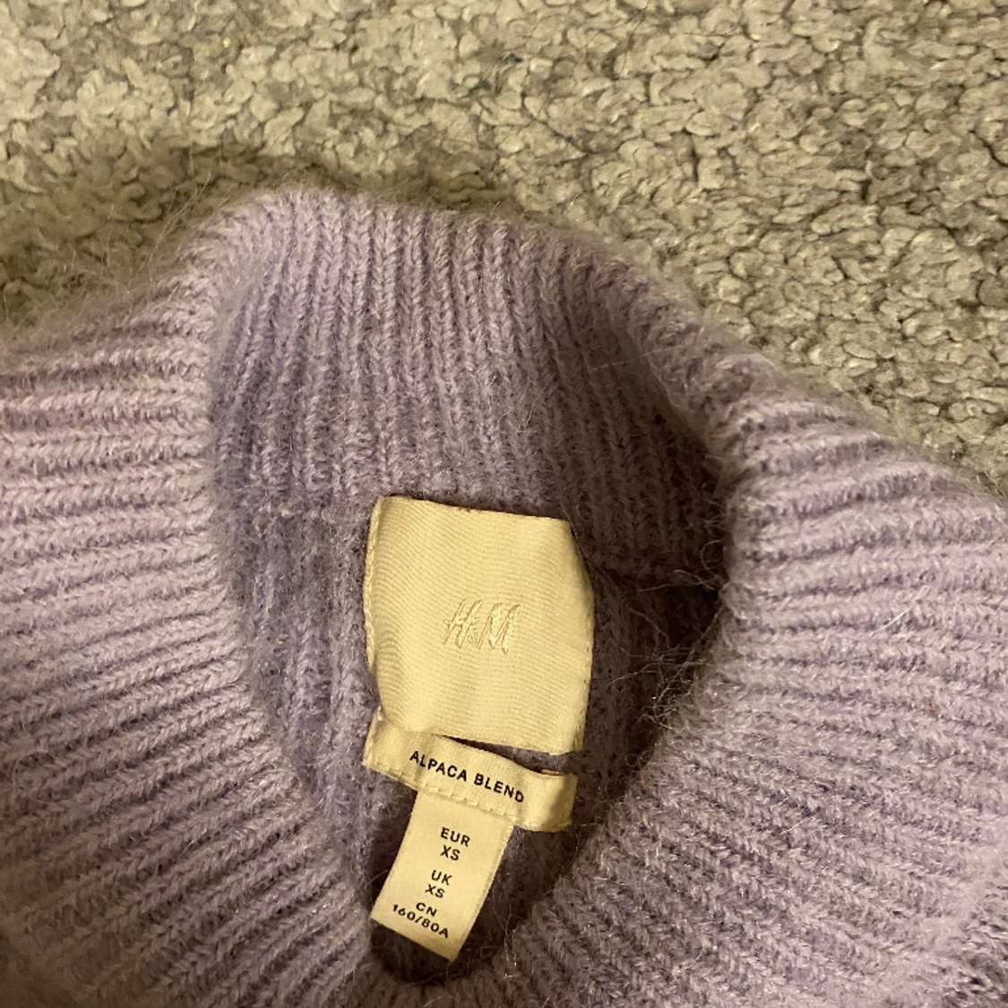 Ljuslila stickad - 90