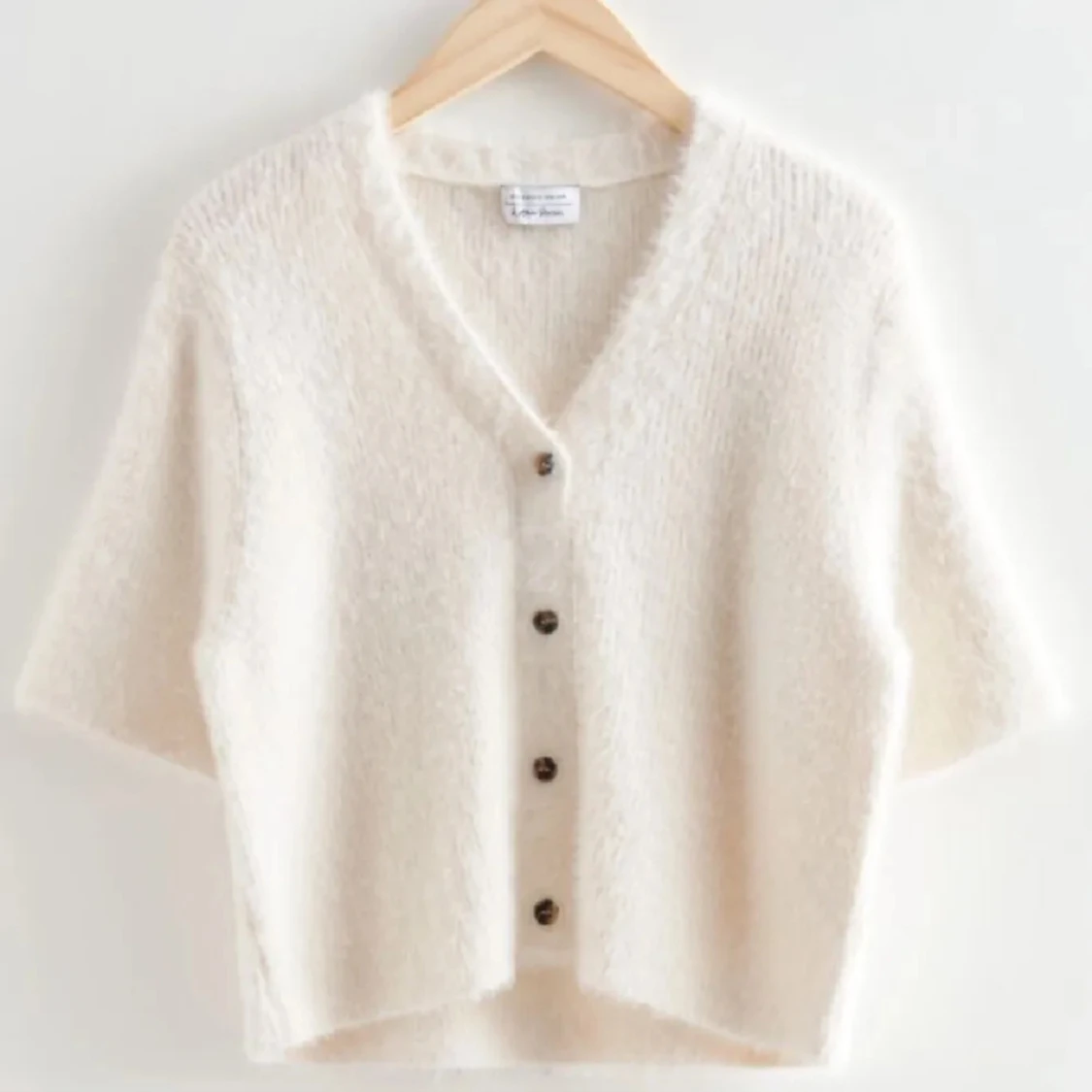 Kortärmad stickad kofta